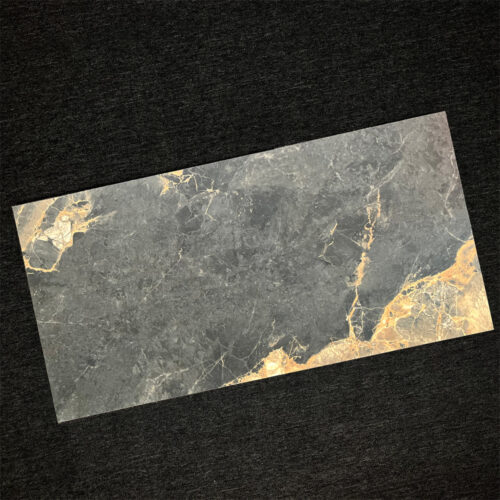 Monash Black large format tile dramatic tawny gold amber blaze veins on dark ground