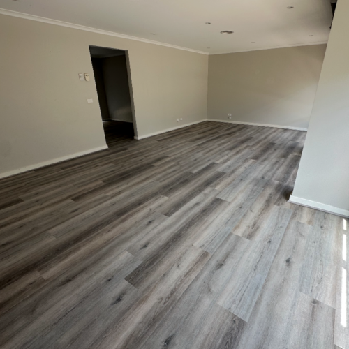 Hybrid 7017 Grey Oak cool grey SPC flooring lifestyle scene — contemporary and composed