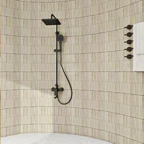 Ivory travertine convex mosaic tile closeup profile detail warm tones
